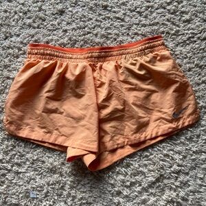 Nike Women's Vibrant Orange Athletic Shorts